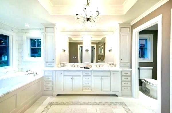 Although double sink bathroom setups often look symmetrical, that's not  always the case