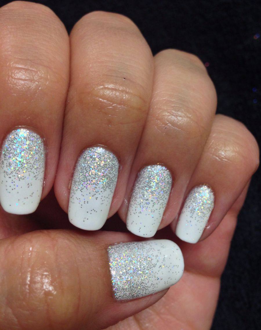 luxury beautiful sparkling silver glitter with white French manicure gel nail art on fashionista woman acrylic