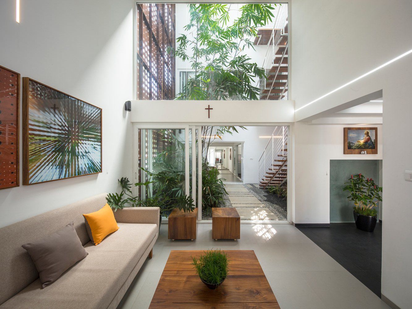 Large hall with couches and plants for relax