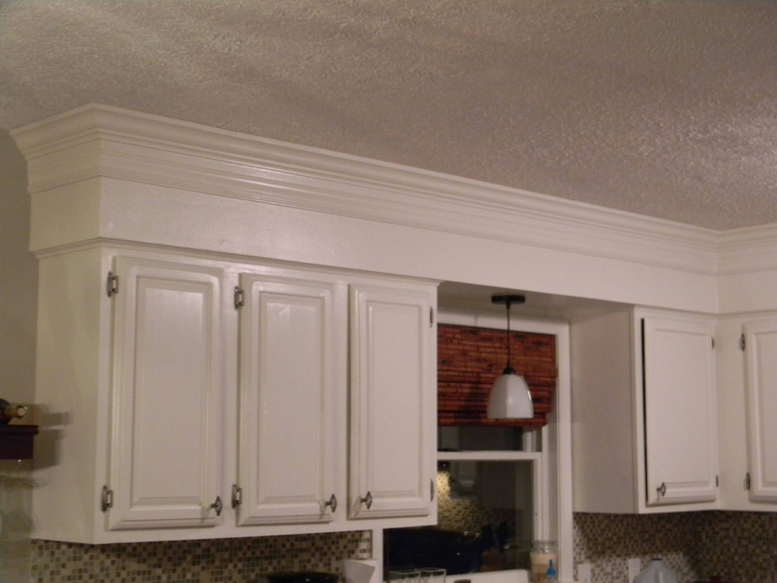 white kitchen cabinets with quartz countertop